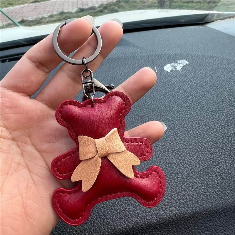 Kreatív ajándék bőr masni medvés autós kulcstartó táska medál aranyos autós kulcstartó gyűrű medál