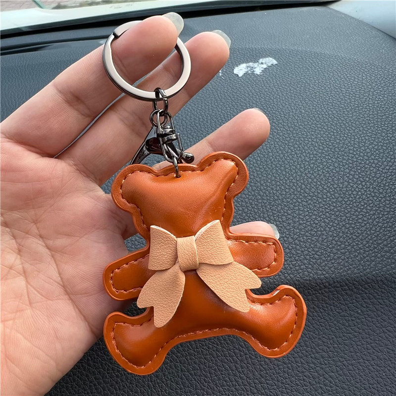 Kreatív ajándék bőr masni medvés autós kulcstartó táska medál aranyos autós kulcstartó gyűrű medál