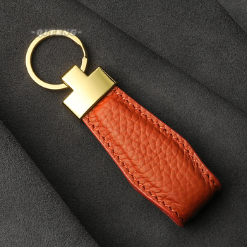 Μπρελόκ αυτοκινήτου από δέρμα αγελάδας με μεταλλικό κρεμαστό δερμάτινο μοτίβο λίτσι H Αρχική σελίδα niche design light luxury markers