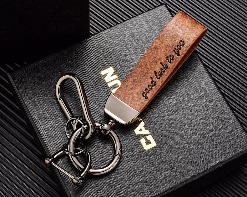 Kiváló minőségű autós kulcstartó hardver elveszett gyűrű bőr kreatív ajándék kulcstartó nyomtatható logó nagykereskedelem
