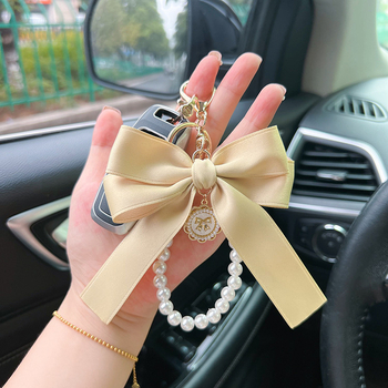 Κορεάτικο στυλ δημιουργικό μεγάλο φιόγκο μαργαριταρένια κορδέλα μπρελόκ κρεμαστό κόσμημα τσάντα αυτοκινήτου online δημοφιλές κρεμαστό κόσμημα μικρό δώρο