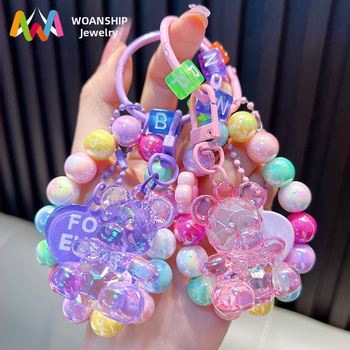 Gyöngyös ülő medve kulcstartó medál, gyönyörű akril táskába akasztható autós kulcstartó, kis ajándék, nagykereskedelem