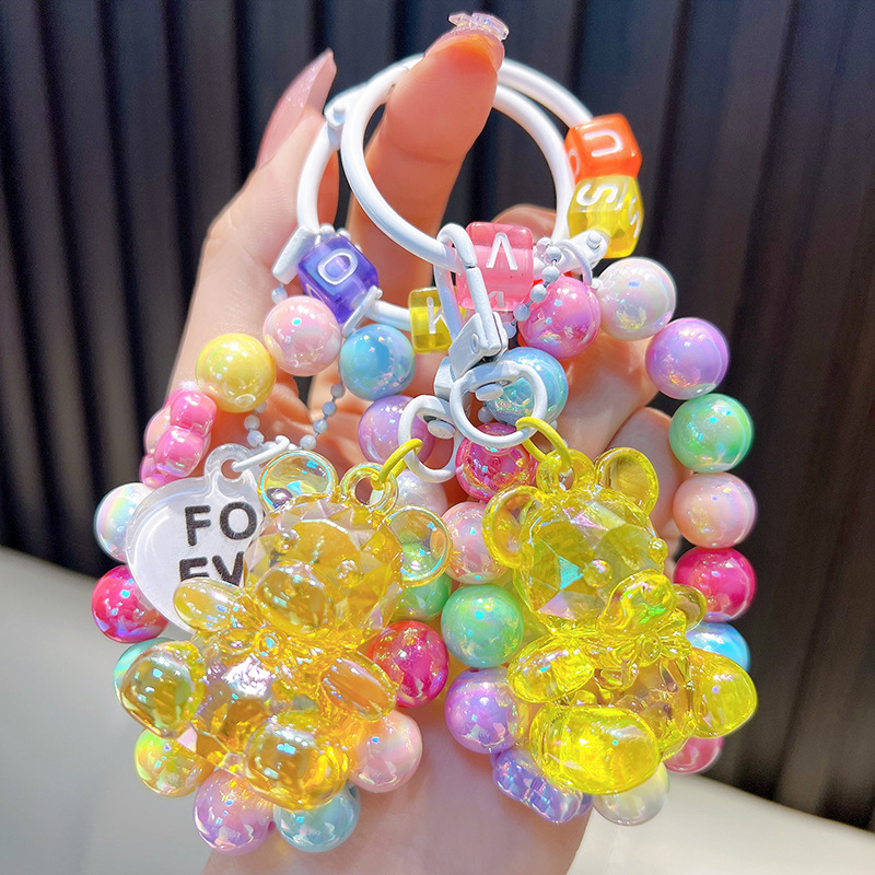 Gyöngyös ülő medve kulcstartó medál, gyönyörű akril táskába akasztható autós kulcstartó, kis ajándék, nagykereskedelem