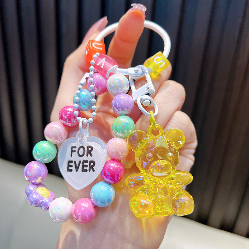 Gyöngyös ülő medve kulcstartó medál, gyönyörű akril táskába akasztható autós kulcstartó, kis ajándék, nagykereskedelem