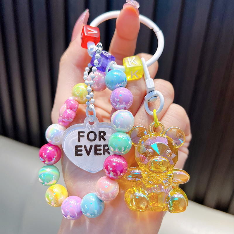 Gyöngyös ülő medve kulcstartó medál, gyönyörű akril táskába akasztható autós kulcstartó, kis ajándék, nagykereskedelem