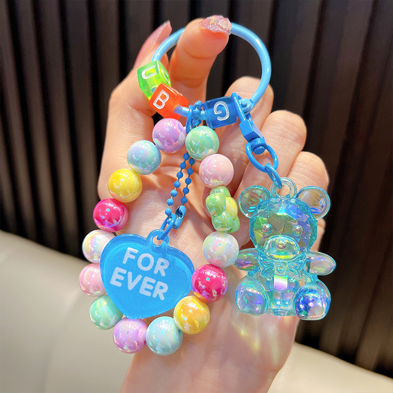 Gyöngyös ülő medve kulcstartó medál, gyönyörű akril táskába akasztható autós kulcstartó, kis ajándék, nagykereskedelem