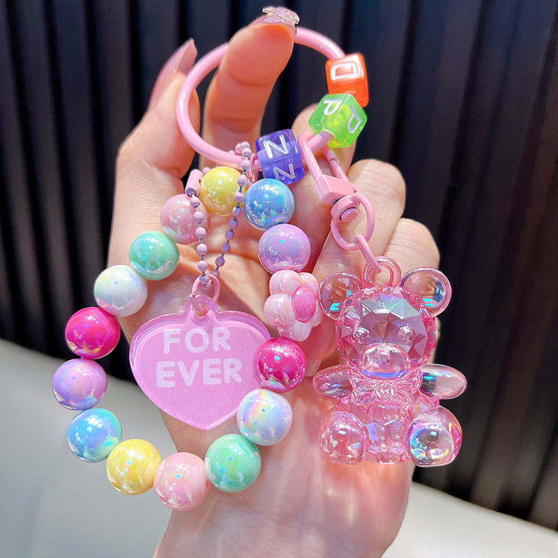 Gyöngyös ülő medve kulcstartó medál, gyönyörű akril táskába akasztható autós kulcstartó, kis ajándék, nagykereskedelem