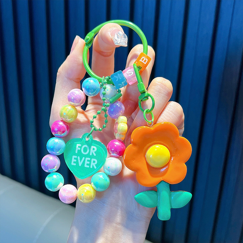 Gyöngyös ülő medve kulcstartó medál, gyönyörű akril táskába akasztható autós kulcstartó, kis ajándék, nagykereskedelem