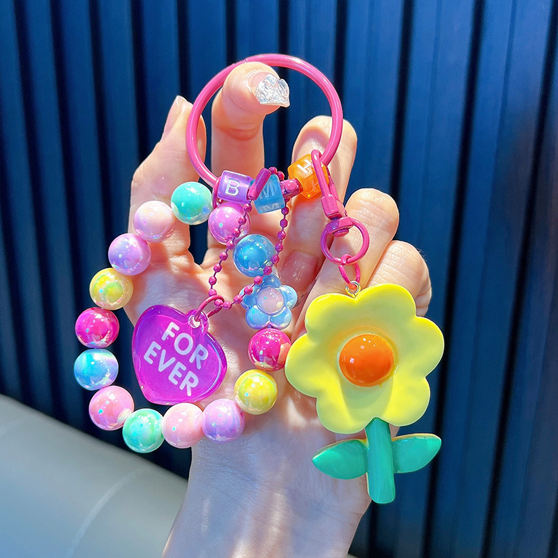 Gyöngyös ülő medve kulcstartó medál, gyönyörű akril táskába akasztható autós kulcstartó, kis ajándék, nagykereskedelem