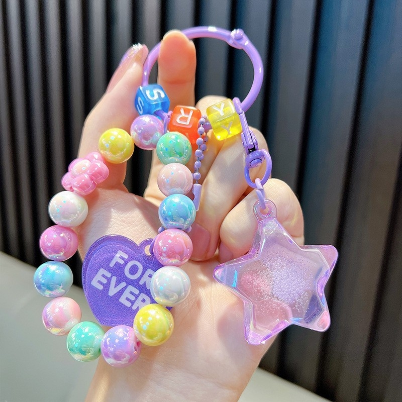 Gyöngyös ülő medve kulcstartó medál, gyönyörű akril táskába akasztható autós kulcstartó, kis ajándék, nagykereskedelem