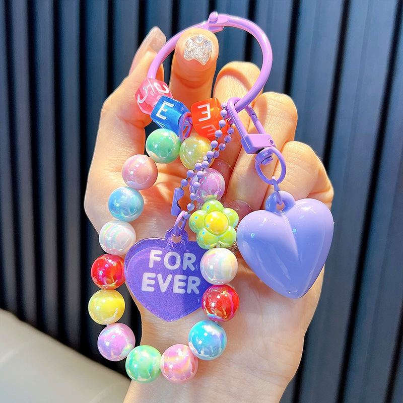 Gyöngyös ülő medve kulcstartó medál, gyönyörű akril táskába akasztható autós kulcstartó, kis ajándék, nagykereskedelem