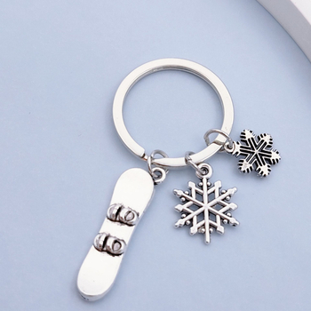 Ευρωπαϊκή και αμερικανική μόδα χιονοδρομία αθλητές snowboarding νιφάδα χιονιού χειμώνα μπρελόκ