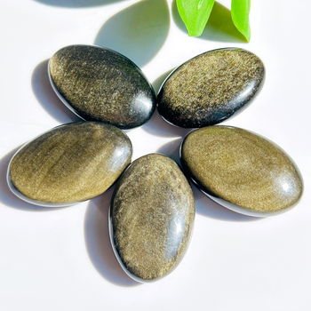 Dabīga zelta obsidiāna oriģinālie akmens rotājumi Zelta obsidiāna zivtiņas poda akmens ar spēcīgu gaismas efektu Sudraba obsidiāna rokturis Rotaļlieta ar formu Plakans rotaļu gabals