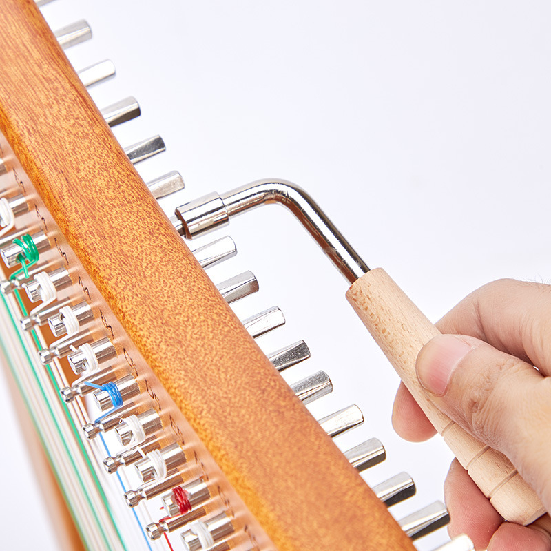 Laiya klaveri helikõrguse reguleerimise võti häälestamisvõti lüüra väike lüüra häälestamisvarras