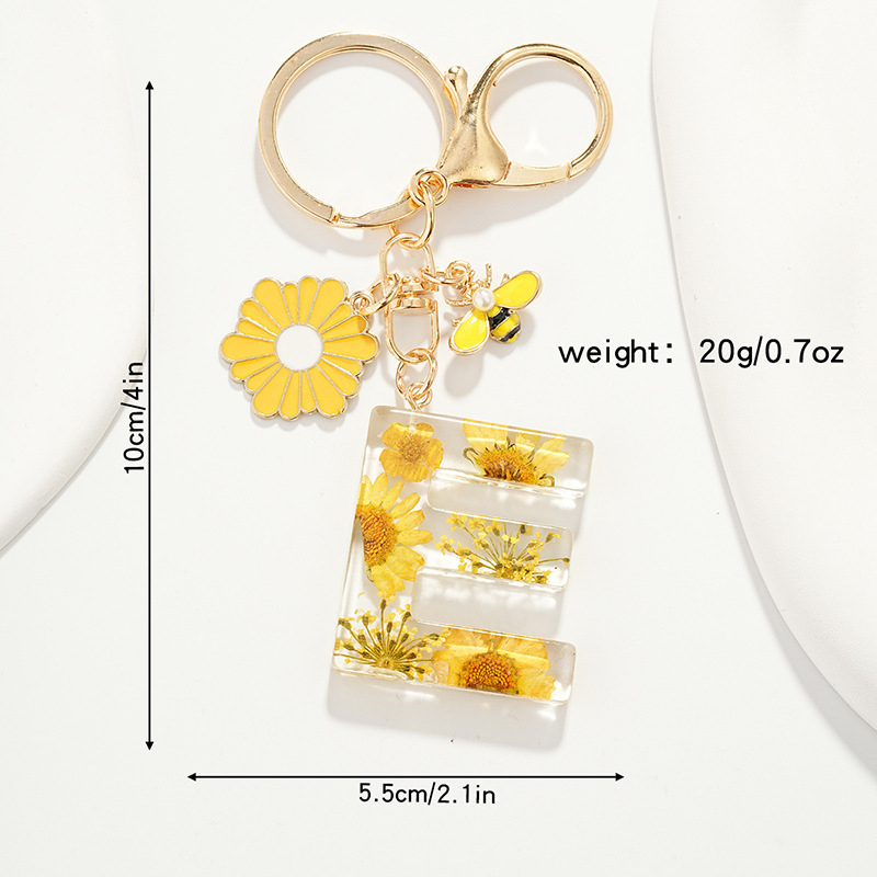 Raktų pakabukas su maža ramunėlių raide, naujas, kutais, geltona chrizantema, džiovinta gėlė, raktų pakabukas, mokyklinė kuprinė