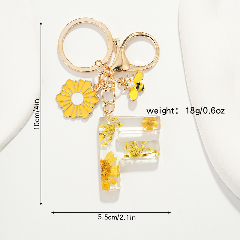 Raktų pakabukas su maža ramunėlių raide, naujas, kutais, geltona chrizantema, džiovinta gėlė, raktų pakabukas, mokyklinė kuprinė