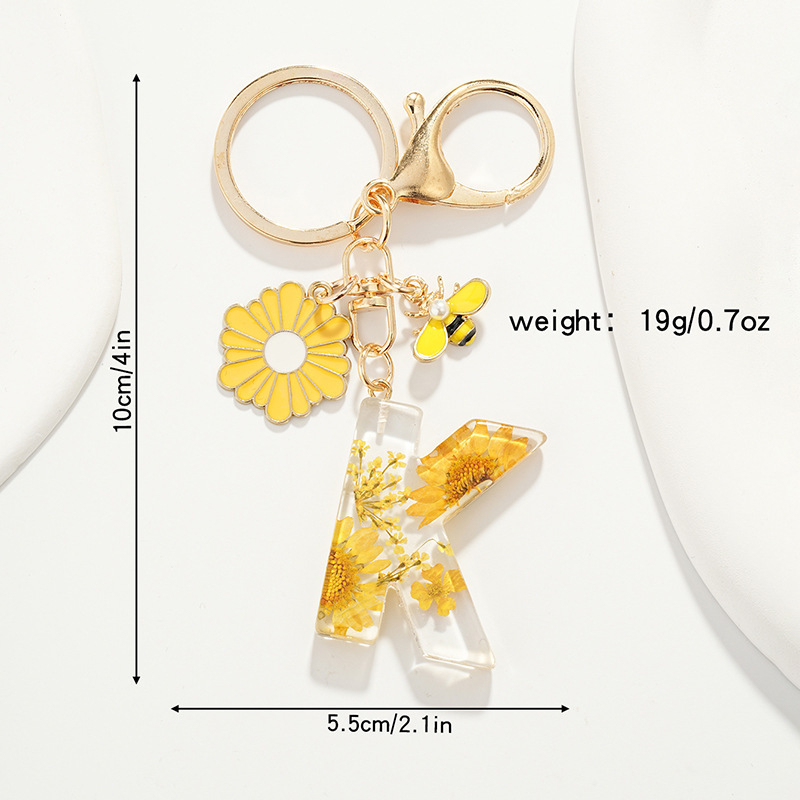 Raktų pakabukas su maža ramunėlių raide, naujas, kutais, geltona chrizantema, džiovinta gėlė, raktų pakabukas, mokyklinė kuprinė