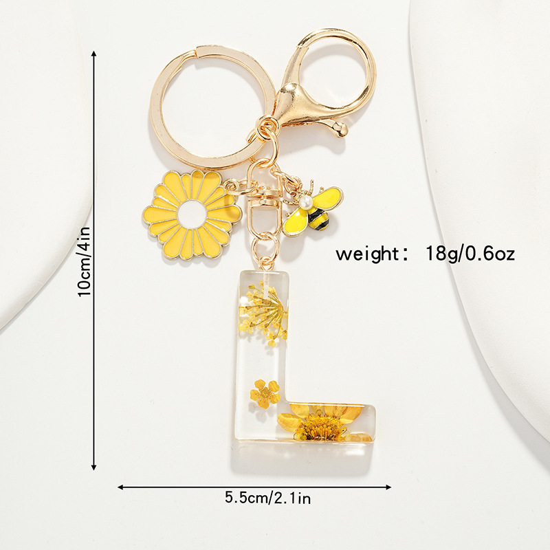 Raktų pakabukas su maža ramunėlių raide, naujas, kutais, geltona chrizantema, džiovinta gėlė, raktų pakabukas, mokyklinė kuprinė