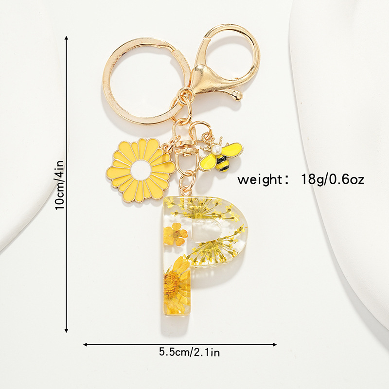 Raktų pakabukas su maža ramunėlių raide, naujas, kutais, geltona chrizantema, džiovinta gėlė, raktų pakabukas, mokyklinė kuprinė