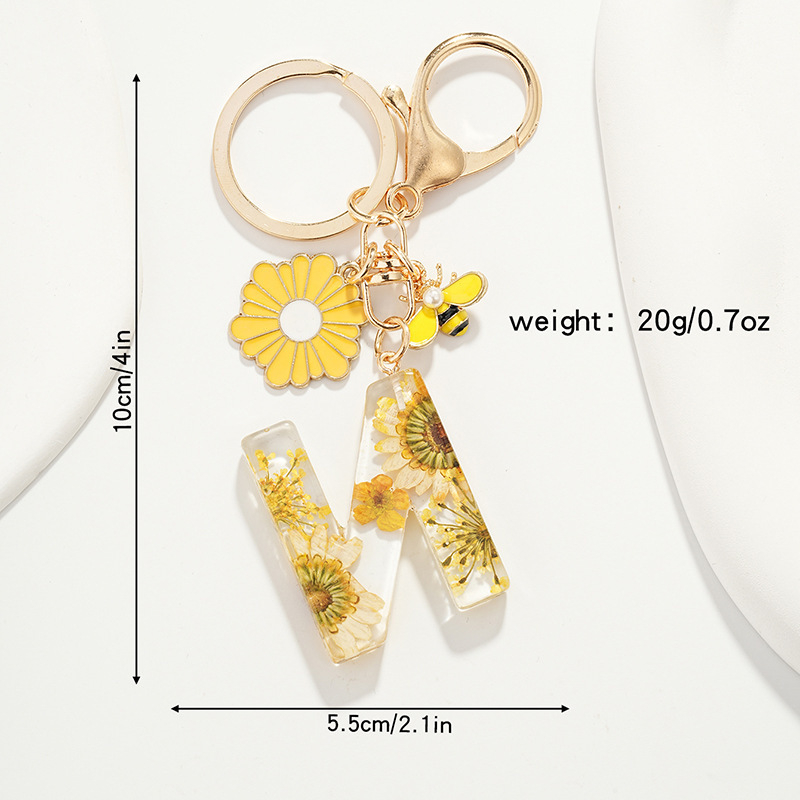 Raktų pakabukas su maža ramunėlių raide, naujas, kutais, geltona chrizantema, džiovinta gėlė, raktų pakabukas, mokyklinė kuprinė