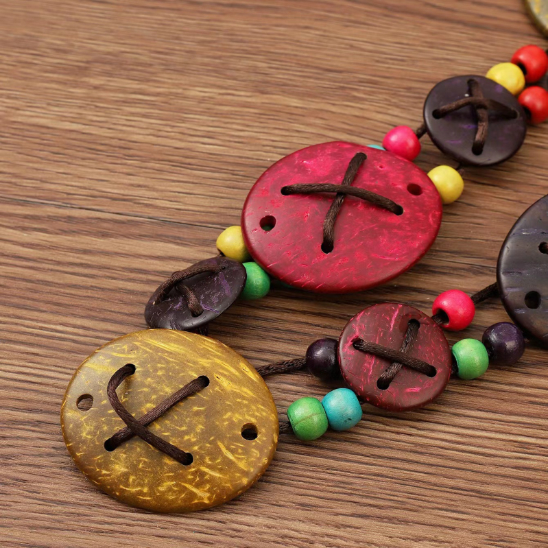 2323 uue stiili naturaalsest kookoskoorest käsitsi valmistatud värviline kookoskoorega kootud universaalne etnilise stiili tantsuvöö kett