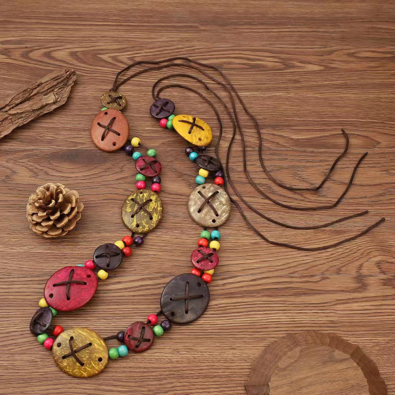 2323 uue stiili naturaalsest kookoskoorest käsitsi valmistatud värviline kookoskoorega kootud universaalne etnilise stiili tantsuvöö kett