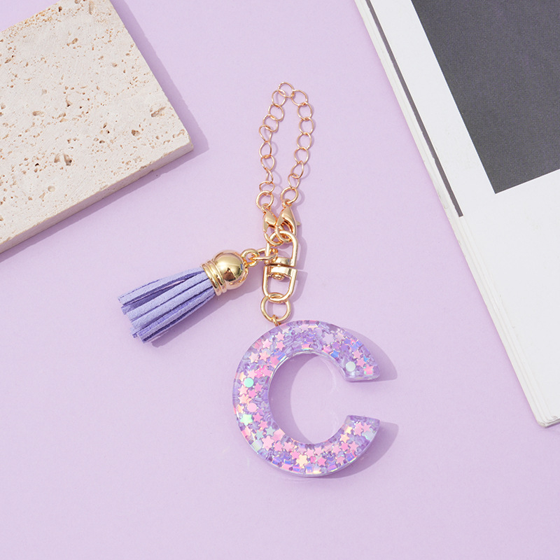 26 angliškų raidžių violetinis kutais ir žvaigždėmis puoštas blizgučiais moteriškas krepšys su vandens puodelio grandinėle, automobilio raktų pakabukas su kryželiu