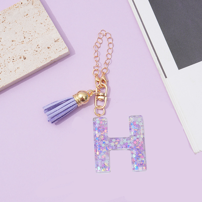 26 angliškų raidžių violetinis kutais ir žvaigždėmis puoštas blizgučiais moteriškas krepšys su vandens puodelio grandinėle, automobilio raktų pakabukas su kryželiu