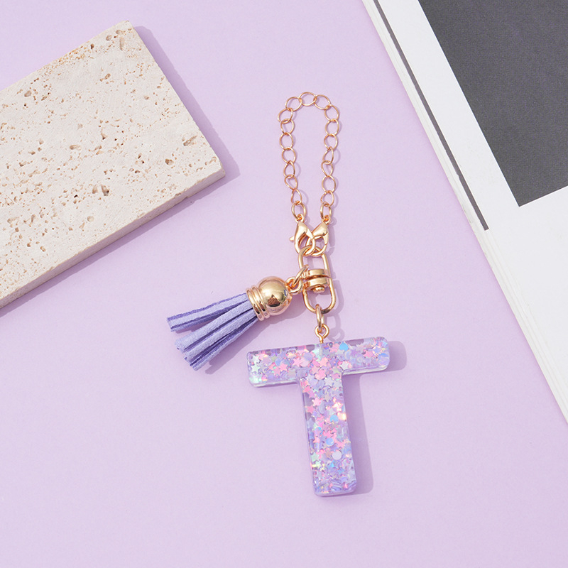 26 angliškų raidžių violetinis kutais ir žvaigždėmis puoštas blizgučiais moteriškas krepšys su vandens puodelio grandinėle, automobilio raktų pakabukas su kryželiu