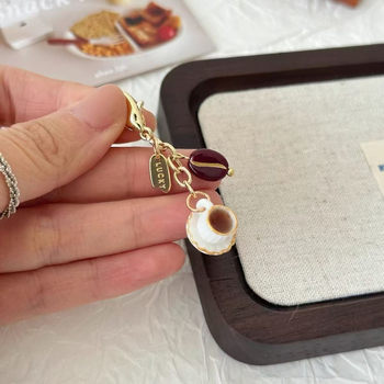 Καλλιτεχνικό στυλ φλιτζάνι καφέ χειρός κρεμαστό κόσμημα ψωμιού τσάντα κρεμαστό δημιουργικό μεταλλικό κρεμαστό βιβλίο χειρός λογαριασμού διακοσμητικό μεταλλικό κρεμαστό κόσμημα