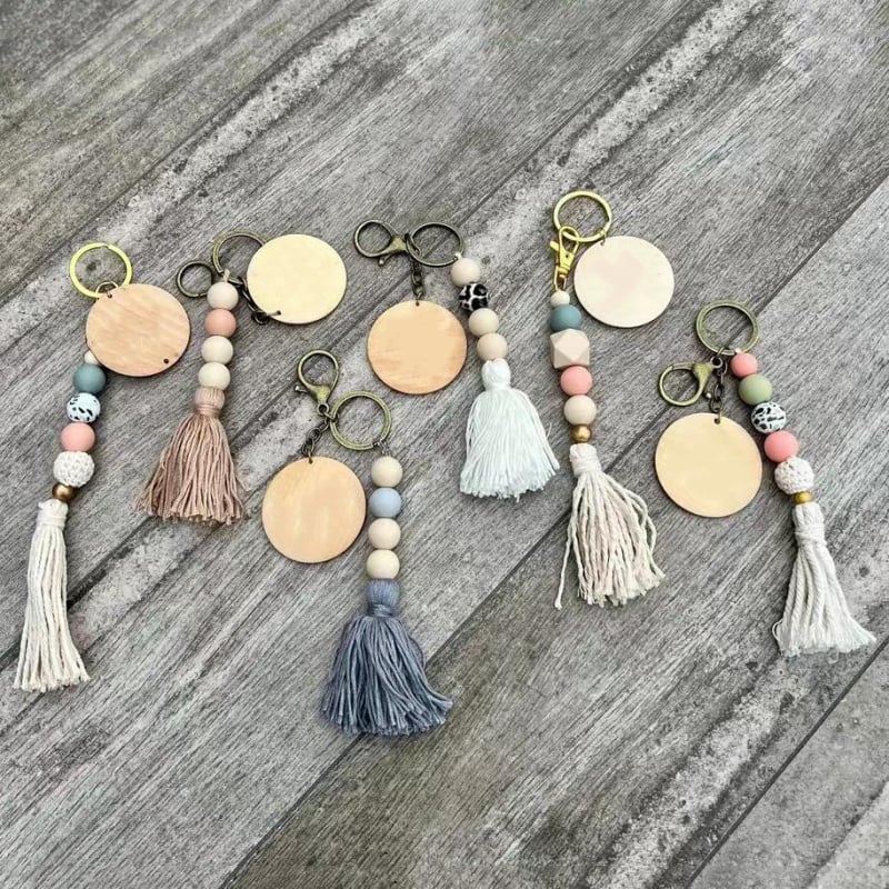 Põhjala stiilis ümmargused puidutükid, puidust helmed, nöörist tutiga võtmehoidja ripats, silikoonhelmestega, käsitööna valminud kotist dekoratiivne ripats