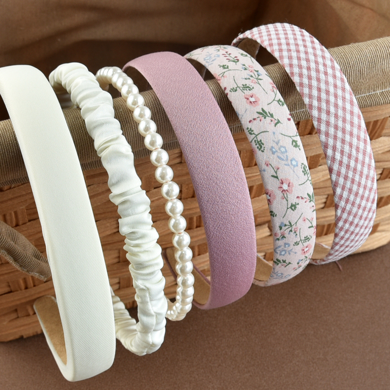 „Amazon“ tarpvalstybinis 6 asmenų grupei skirtas gėlių rašto vienspalvis plaukų juostelių derinys