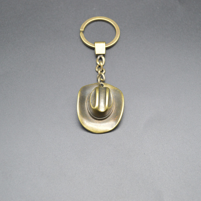 Nauji raktų pakabukų aksesuarai, kaubojaus skrybėlės pakabukas, kūrybinga dovana, „Amazon“ tarpvalstybinis karšto metalo raktų pakabukas