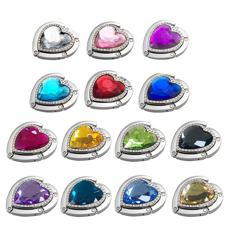 sandėlyje yra širdies formos vienos eilės gręžimo stalo kabliukas, daugiaspalvis, pasirenkamas sulankstomas kabliukas, „Gem“ akrilinis gręžimo stalo kabliukas