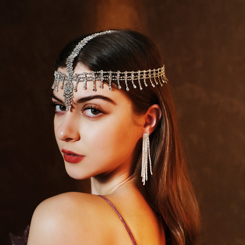 Euroopa ja Ameerika moe isiksuse palliga juukseaksessuaarid, kerged luksuslikud rhinestone`i kulmude ripatsiga juuksepaelad, liialdatud mitmekihilised virnastatud moekad juukseketid