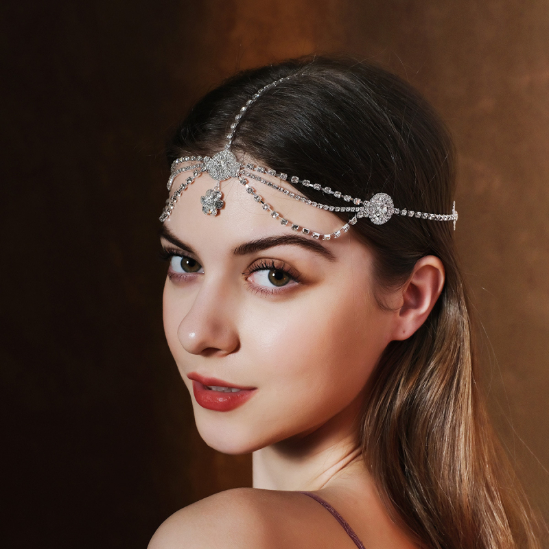 Euroopa ja Ameerika moe isiksuse palliga juukseaksessuaarid, kerged luksuslikud rhinestone`i kulmude ripatsiga juuksepaelad, liialdatud mitmekihilised virnastatud moekad juukseketid