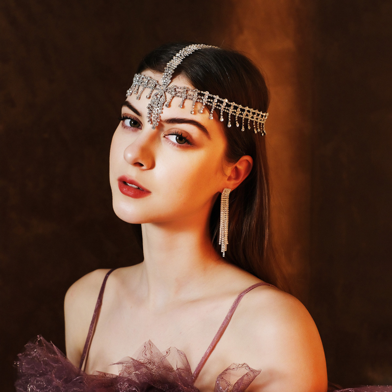 Euroopa ja Ameerika moe isiksuse palliga juukseaksessuaarid, kerged luksuslikud rhinestone`i kulmude ripatsiga juuksepaelad, liialdatud mitmekihilised virnastatud moekad juukseketid