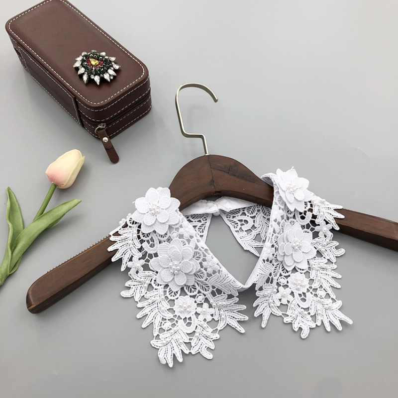 Mūsų gamykla gamina smėlyje tirpius siuvinėjimus ir trimačius mažų gėlių imitacinius antkaklius, gamykloje yra visų rūšių imitacinių antkaklių drabužių aksesuarų.