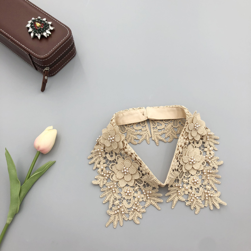 Mūsų gamykla gamina smėlyje tirpius siuvinėjimus ir trimačius mažų gėlių imitacinius antkaklius, gamykloje yra visų rūšių imitacinių antkaklių drabužių aksesuarų.