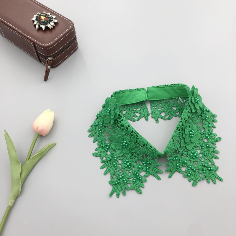 Mūsų gamykla gamina smėlyje tirpius siuvinėjimus ir trimačius mažų gėlių imitacinius antkaklius, gamykloje yra visų rūšių imitacinių antkaklių drabužių aksesuarų.