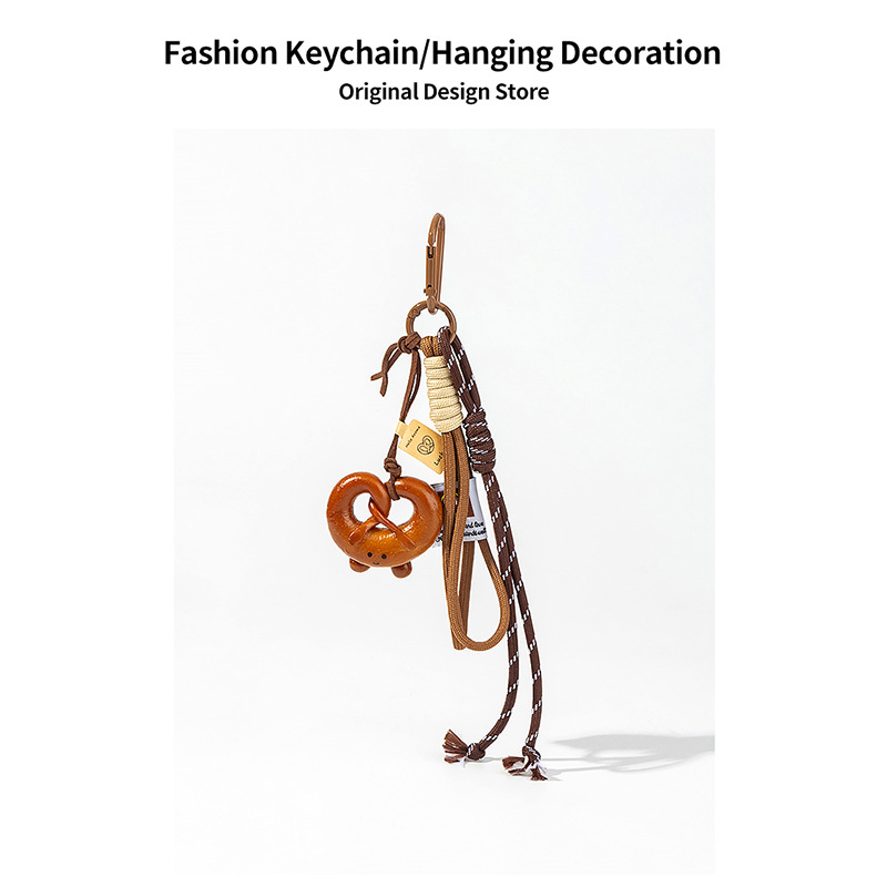 „Maillard Brown“ korėjietiško stiliaus šokoladinis riestainis su šarminiu mazgu, dekoratyvinė grandinėlė su „Miu“ šarminės duonos pakabuku