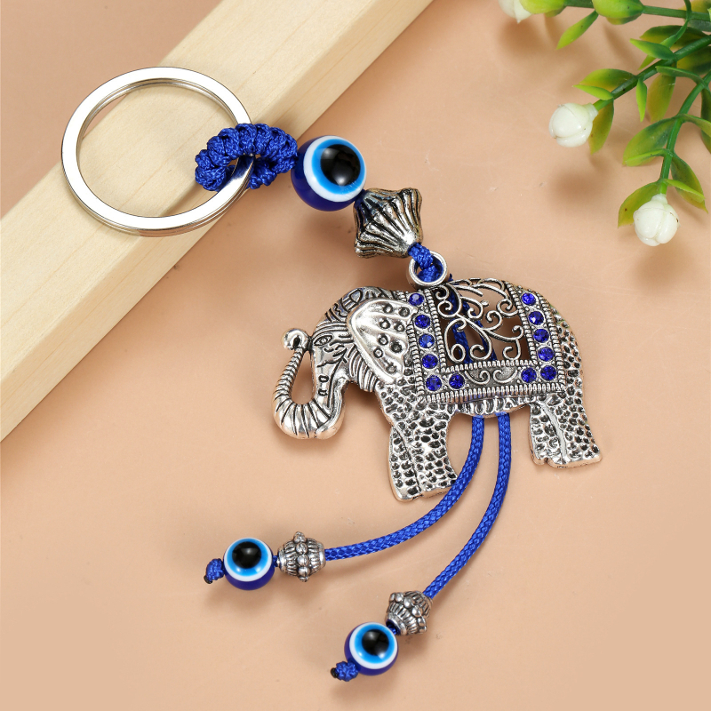 Piiriülene võtmehoidja, kuradisilma lehed, liblikas, piiriülene ehe, loominguline võtmehoidja, sinine silmakott, ripats