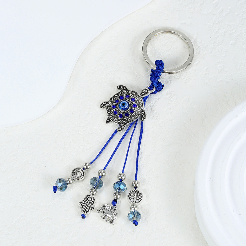 Piiriülene võtmehoidja, kuradisilma lehed, liblikas, piiriülene ehe, loominguline võtmehoidja, sinine silmakott, ripats