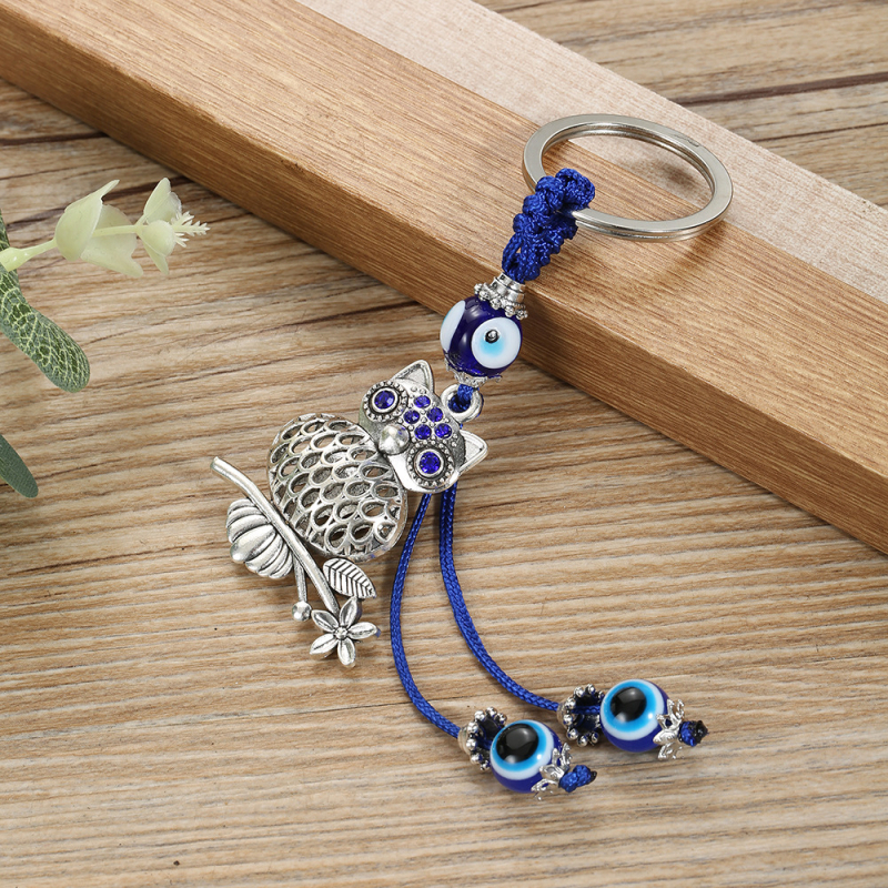 Piiriülene võtmehoidja, kuradisilma lehed, liblikas, piiriülene ehe, loominguline võtmehoidja, sinine silmakott, ripats