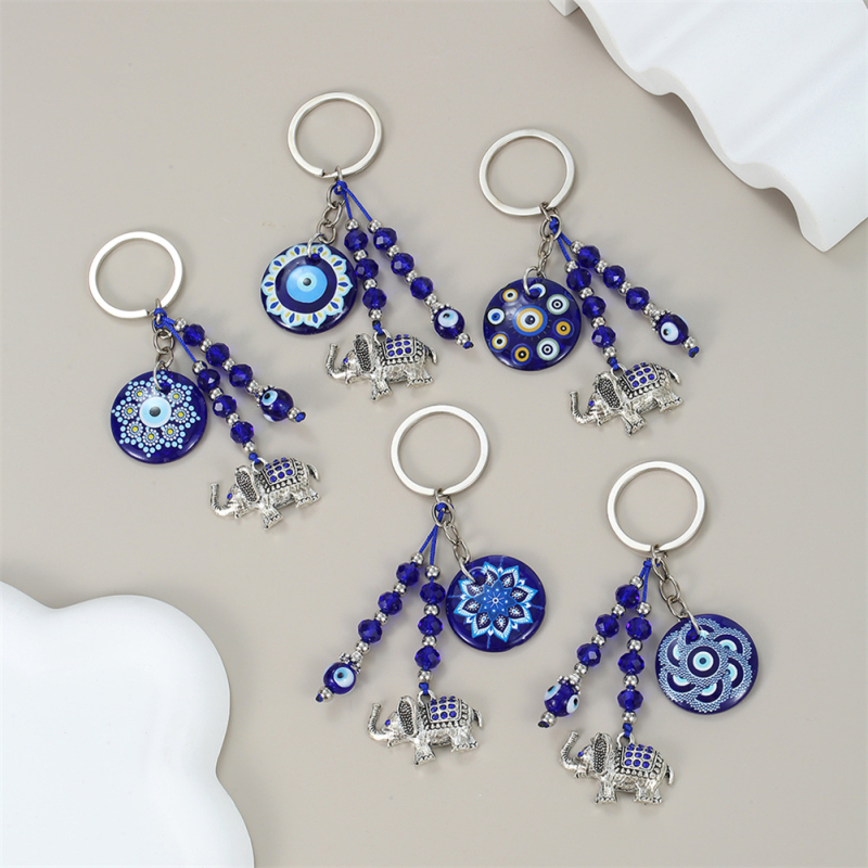 Piiriülene võtmehoidja, kuradisilma lehed, liblikas, piiriülene ehe, loominguline võtmehoidja, sinine silmakott, ripats