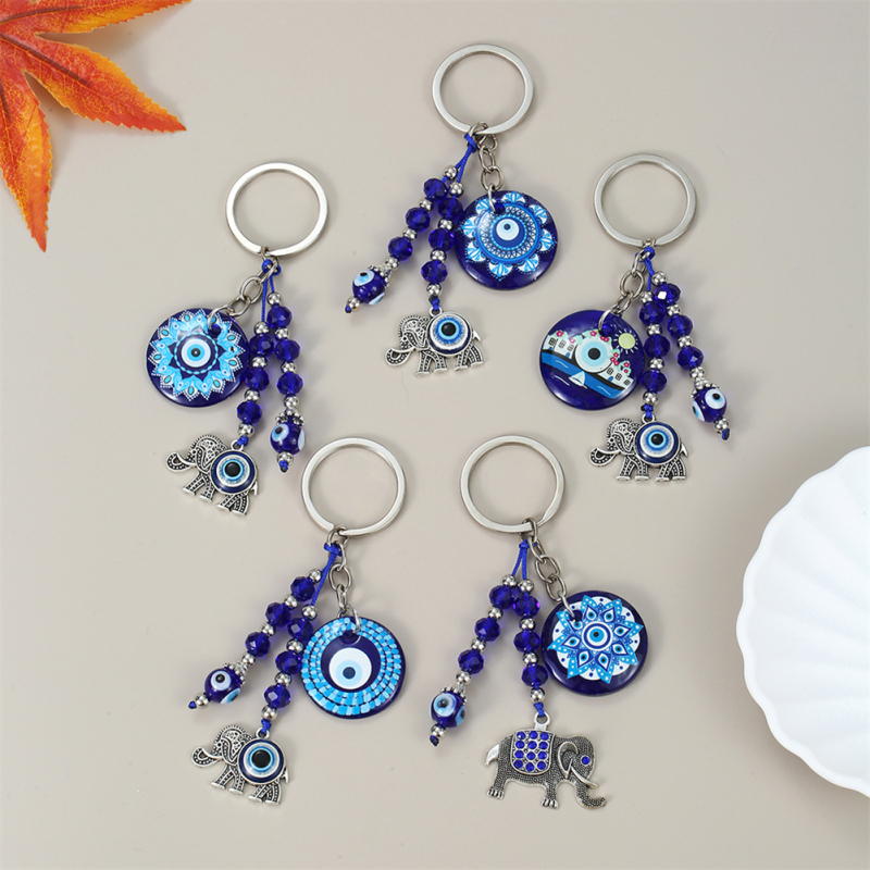 Piiriülene võtmehoidja, kuradisilma lehed, liblikas, piiriülene ehe, loominguline võtmehoidja, sinine silmakott, ripats