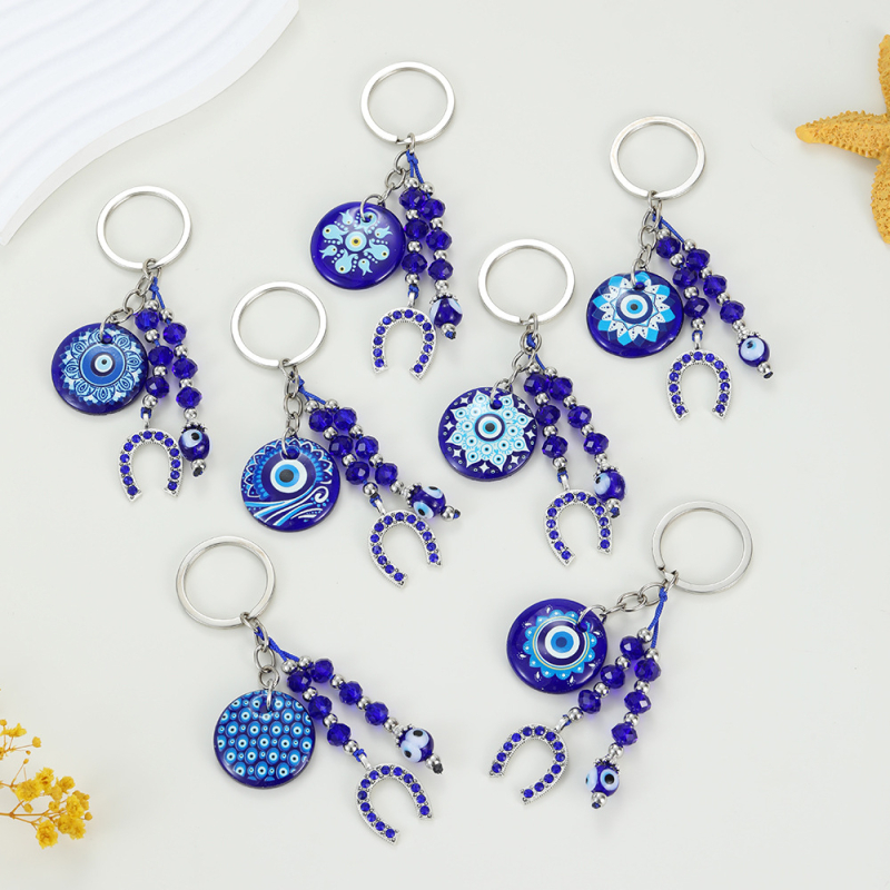 Piiriülene võtmehoidja, kuradisilma lehed, liblikas, piiriülene ehe, loominguline võtmehoidja, sinine silmakott, ripats