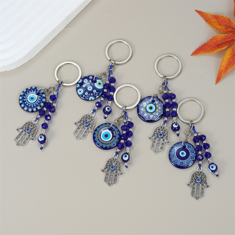 Piiriülene võtmehoidja, kuradisilma lehed, liblikas, piiriülene ehe, loominguline võtmehoidja, sinine silmakott, ripats