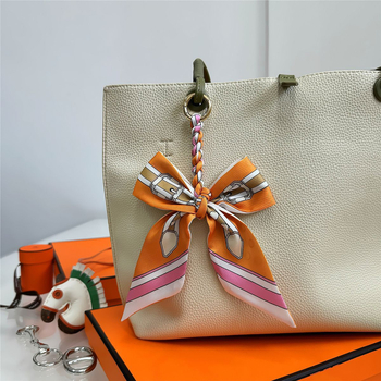 Νότια Κορέα Dongdaemun Internet Celebrant Νέα τσάντα με τόξο πόρπη Hangzhou Υψηλής ποιότητας Twill μετάξι μόδας κρεμαστό κόσμημα τυπωμένο διασυνοριακά