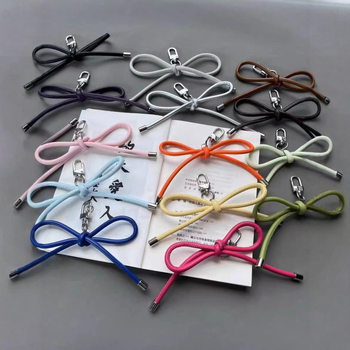 Τσάντα Blogger με τόξο, κρεμαστό κόσμημα, δερμάτινο σχοινί, υφαντό μπρελόκ, γλυκιά, φρέσκια θήκη τηλεφώνου, κρεμαστή διακόσμηση